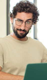 Arrogant man at computer